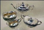 Silver Teapot and Accessories Silver Teapot and Accessories