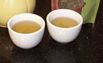 White sipping cups are perfect for trying this Green Chai