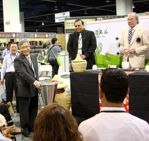 Thomas Shu, Devan Shah, and James Norwood Pratt at the ABC Tea booth