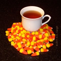 Tea sip - candy corn - tea sip - candy corn - ahhh!