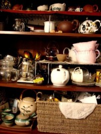 febpp2-tearoom_shelf - small Shelves overflowing with tea and tea ware.