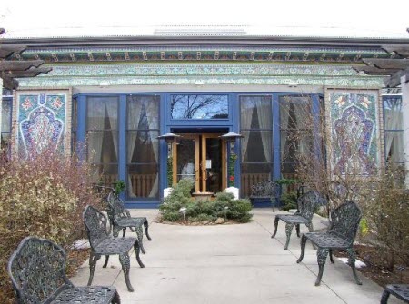 The exterior of Dushanbe Boulder Tea House is covered in handmade ceramic tiles The exterior of Dushanbe Boulder Tea House is covered in handmade ceramic tiles