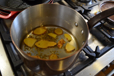 A pot of Ginger Fennel Infusion cooling on my stovetop A pot of Ginger Fennel Infusion cooling on my stovetop