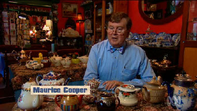 Maurice Cooper with some of his collection of 4,000 teapots