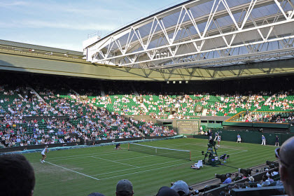A match on Centre Court at Wimbledon is the perfect chance to enjoy a cup of tea (image from Wikimedia commons). A match on Centre Court at Wimbledon is the perfect chance to enjoy a cup of tea (image from Wikimedia commons).
