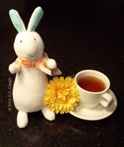 “Bob the Tea Bunny” with one of his fave Fall flowers: a bright yellow Chrysanthemum! (Photo source: A.C. Cargill, all rights reserved) “Bob the Tea Bunny” with one of his fave Fall flowers: a bright yellow Chrysanthemum! (Photo source: A.C. Cargill, all rights reserved)