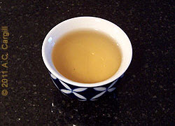 You don’t have to slurp and spit like a pro to get true tea enjoyment. Try sipping from a little cup like this one. (Photo source: A.C. Cargill, all rights reserved)