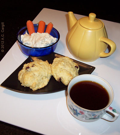 Eating and typing online for the virtual tea tasting can be rather awkward! (Photo source: A.C. Cargill, all rights reserved) Eating and typing online for the virtual tea tasting can be rather awkward! (Photo source: A.C. Cargill, all rights reserved)