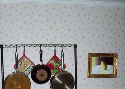 That childhood habit of letting my eyes wonder round and round a wallpaper pattern has persisted to adulthood, causing burnt toast and oversteeped tea! This was the wallpaper in a previous house we owned. (Photo source: A.C. Cargill, all rights reserved)