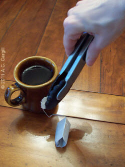 The only safe way this Tea Princess handles a teabag! (Photo source: A.C. Cargill, all rights reserved)