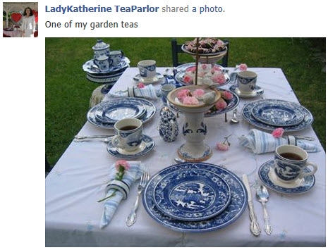 A tea time table set with blue transferware. (screen capture from Facebook)