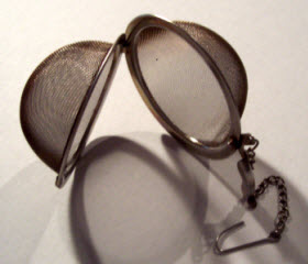 The hinged tea ball can easily pop open and is also tricky to fill. (Photo by A.C. Cargill, all rights reserved)