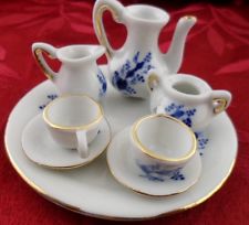 Tiny Tea Cup And Saucer Set with Teapot Creamer Sugar Bowl (screen capture from site)