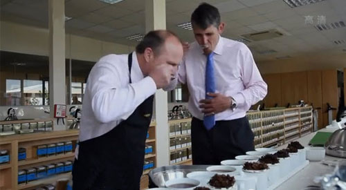 Stephen Twining (right) helping to get the proper blend (Screen capture from video)
